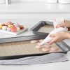 2-pack of non-stick silicone baking mats with macaron cookie template for easy and reliable baking